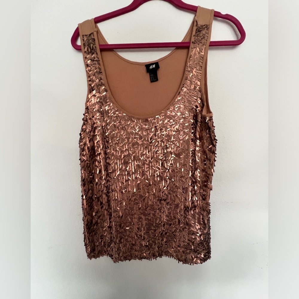 Fancy glistening top. Copper in color.